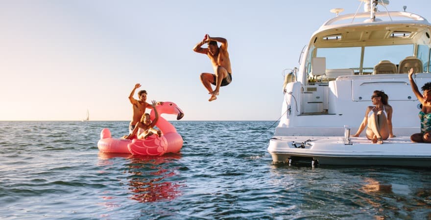 Guests enjoying fun moments aboard the yacht charter